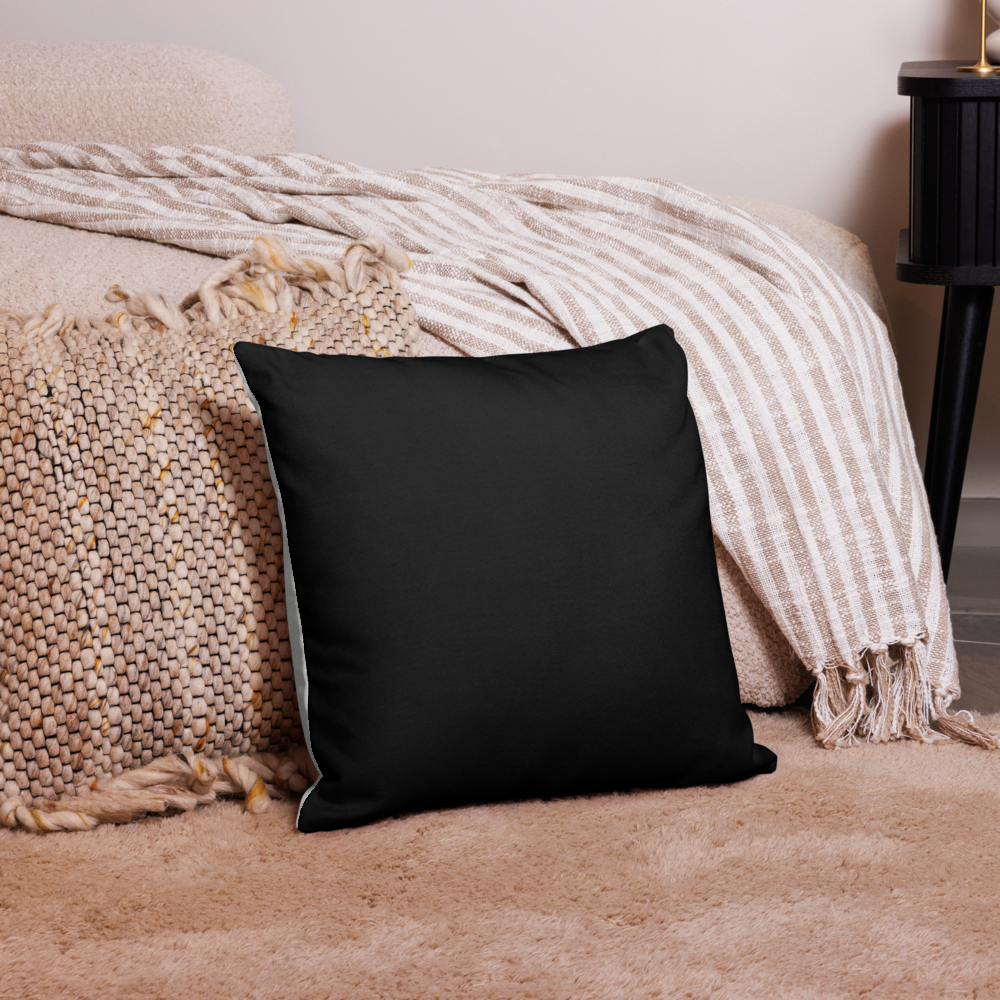 Interior room view with a Premium Pillow with a silver cover with a black back and photo of a budding Lily