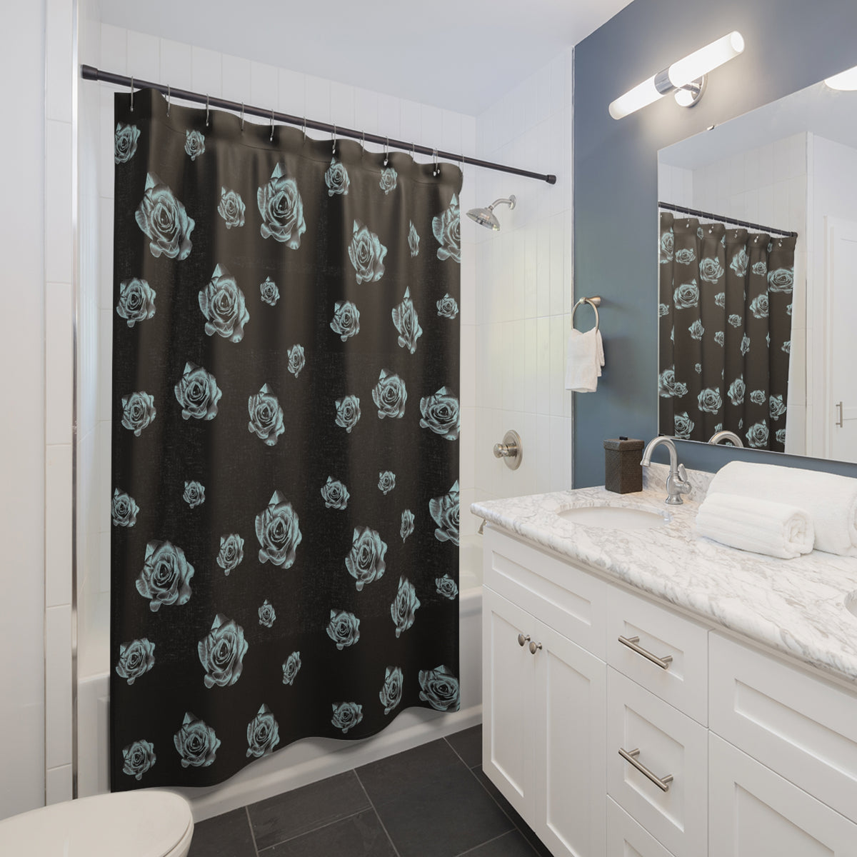 bathroom view with a shower curtain that's black with a silver rose pattern