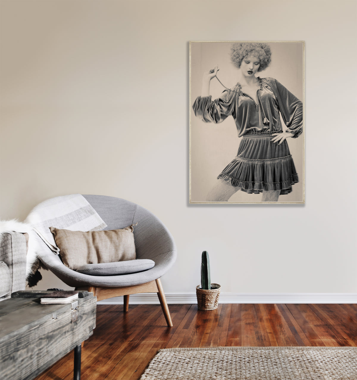 living room setting for Fine art  framed poster of a young woman in a heavy fabric dress and curly wig with an antique colour tone and feel