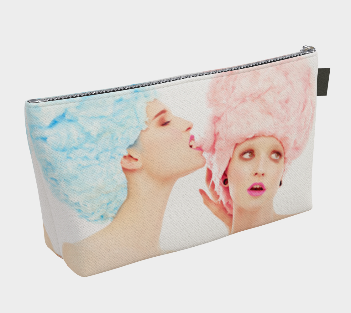 canvas make up bag with the image of two young girls with cotton candy hair. One is eating the other ones hair