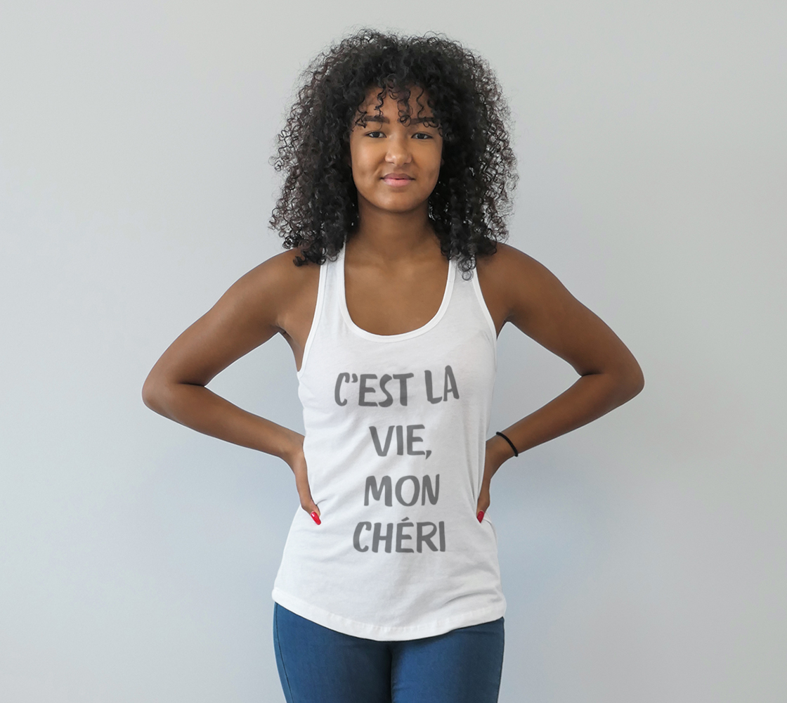 girl wearing white tank top that says "c'est la vie, mon cheri"